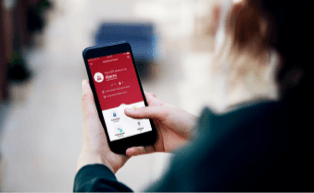 person viwing live camera feed on phone